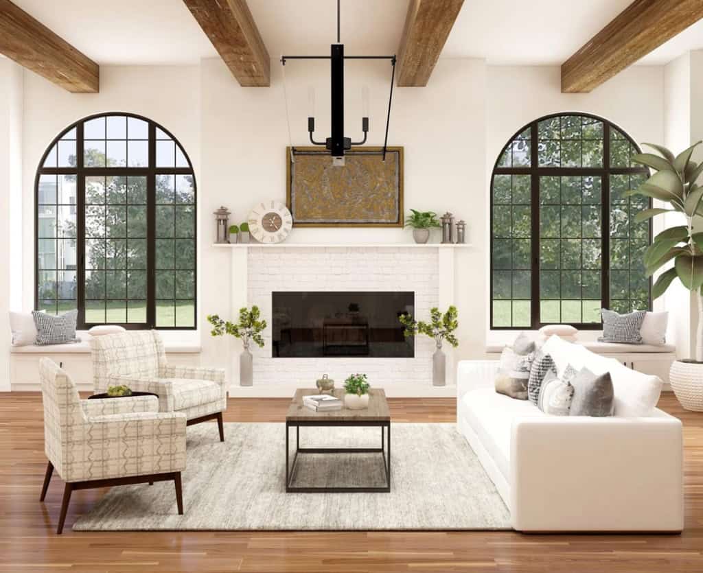 The living area of a high-end modern home with beam ceilings and black arched windows.